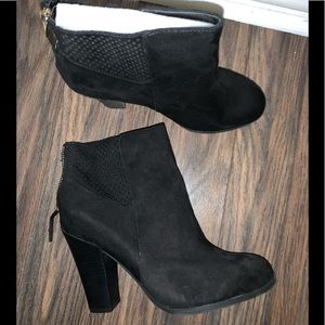 Black ankle booties by Call It Spring. Brand new.